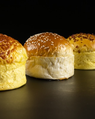 Pães brioche da Briox Baker · a gama, em fila